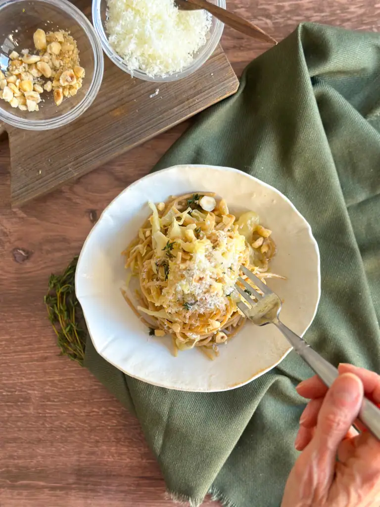 Easting cabbage pasta from the bowl