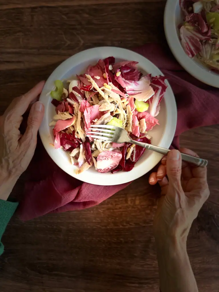 Italian CHicken Salad with Radicchio in hands