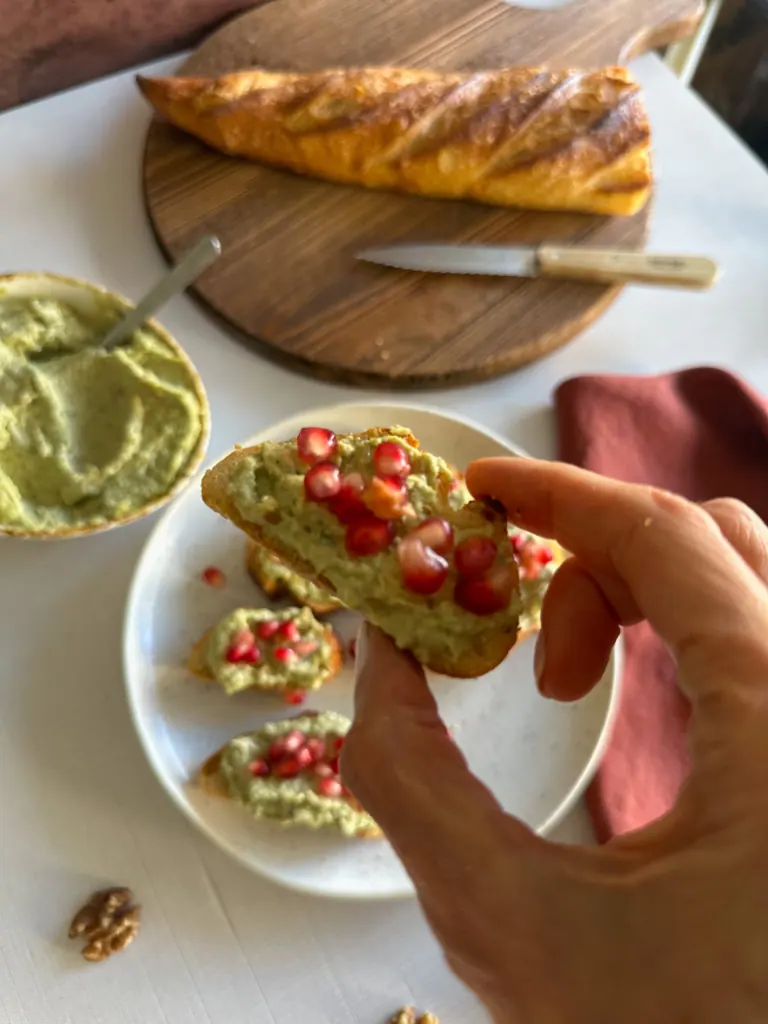 salsa di noci over a bite of crostini