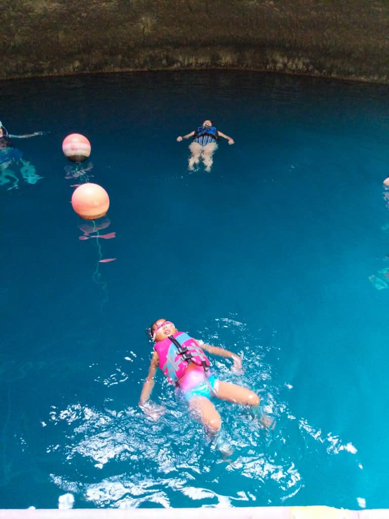 people floating on their back at Homestead Crater