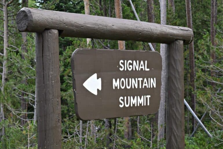 The Signal Mountain road sign across from Jackson Lake