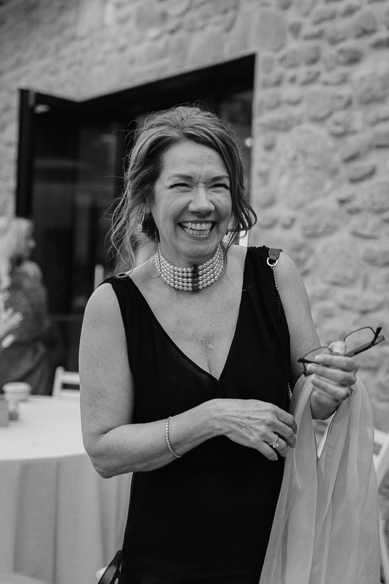 Wedding guest laughing and enjoying the celebration
