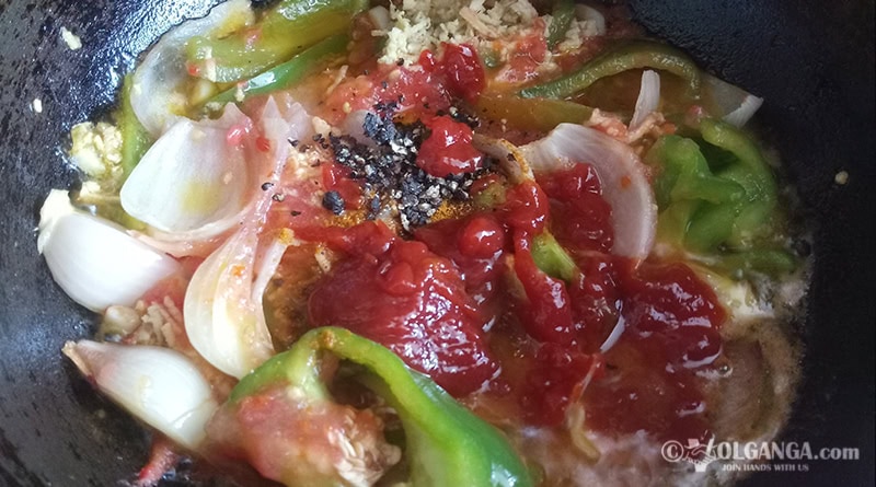 Frying ingredients for chilli paneer