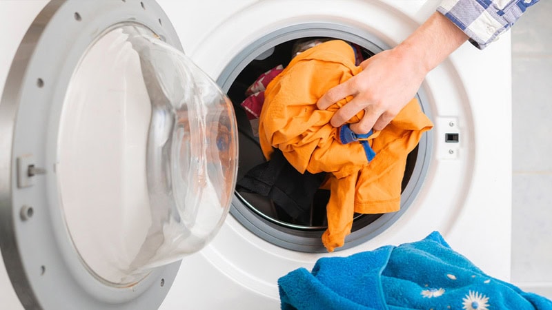 Wash clothes with warm (60°C) water