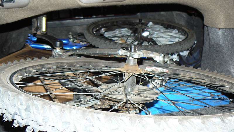 Bicycle in the trunk of a car