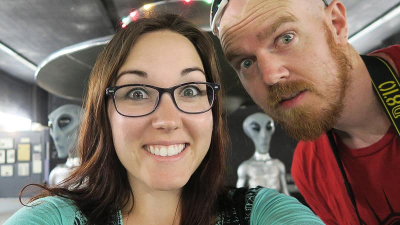 Brooke and Buddy posing with the roswell aliens while visiting Roswell, NM