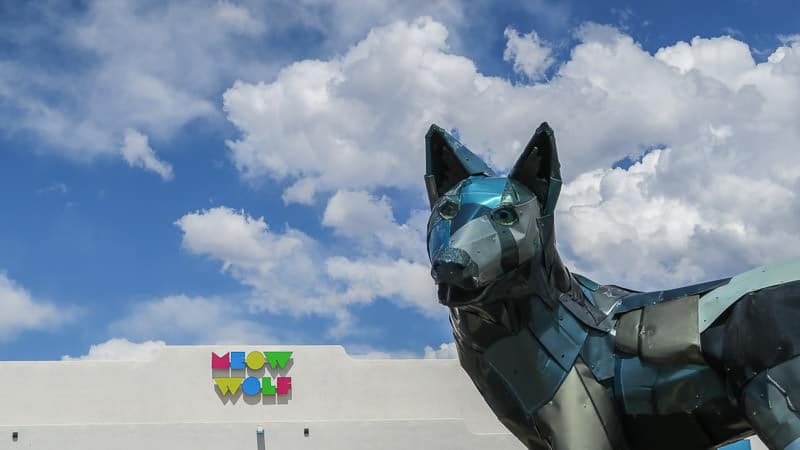 Outside wolf and sign for Meow Wolf in Santa Fe