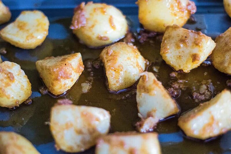 Roast Potatoes with Paprika on baking tray | amateurchef.co.uk