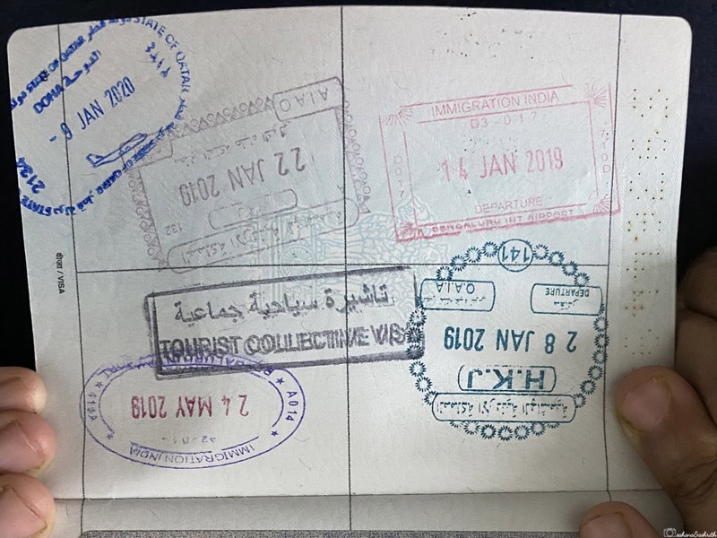 Indian passport with stamps from various countries showing trip planning