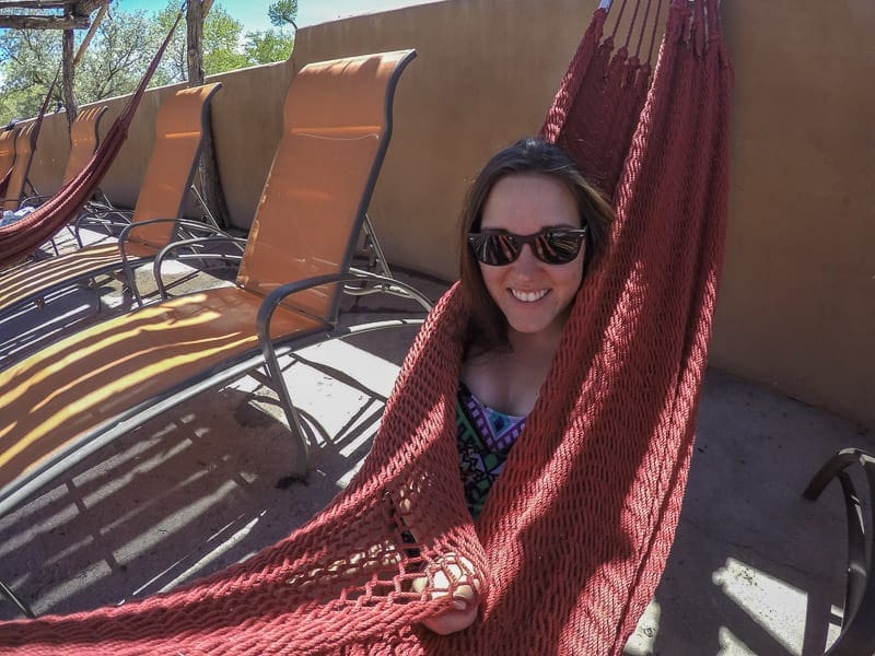 Brooke cuddled up in a hammock after a warm soak