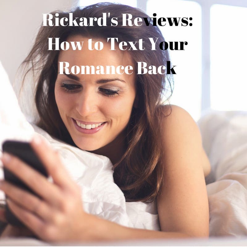 Happy woman lying in bed, smiling at her phone while texting, representing rekindling romance through thoughtful messages.