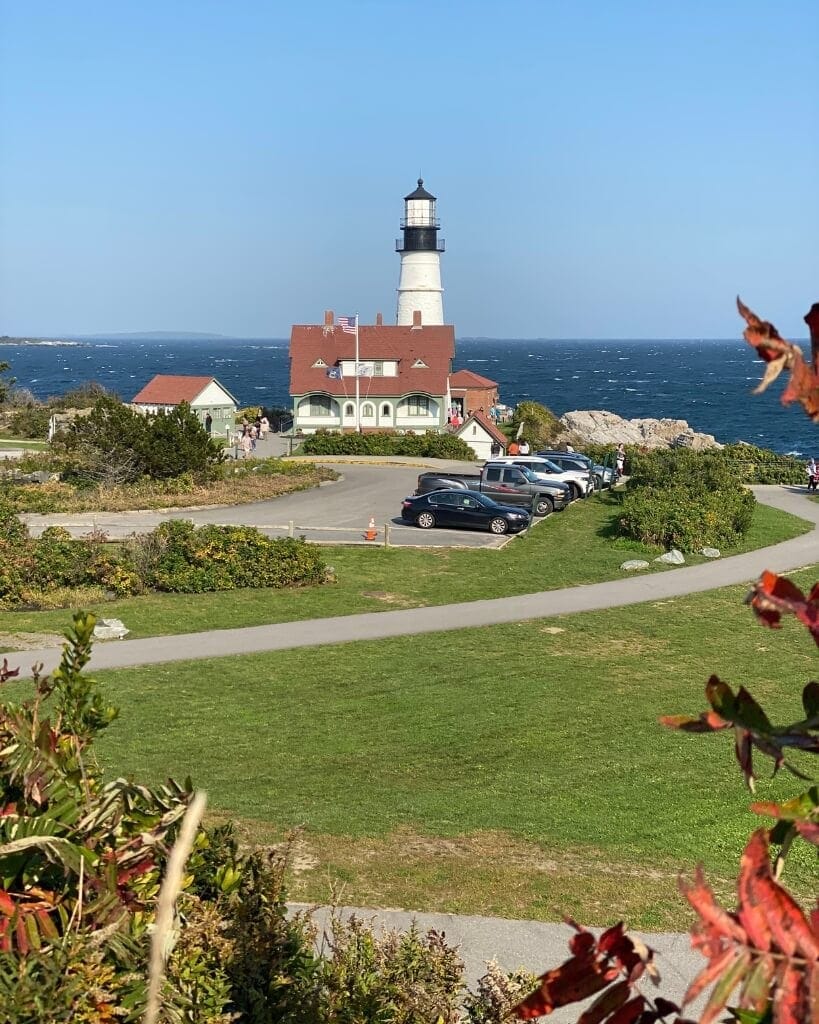 sunny day over portland head light in fort williams park portland maine