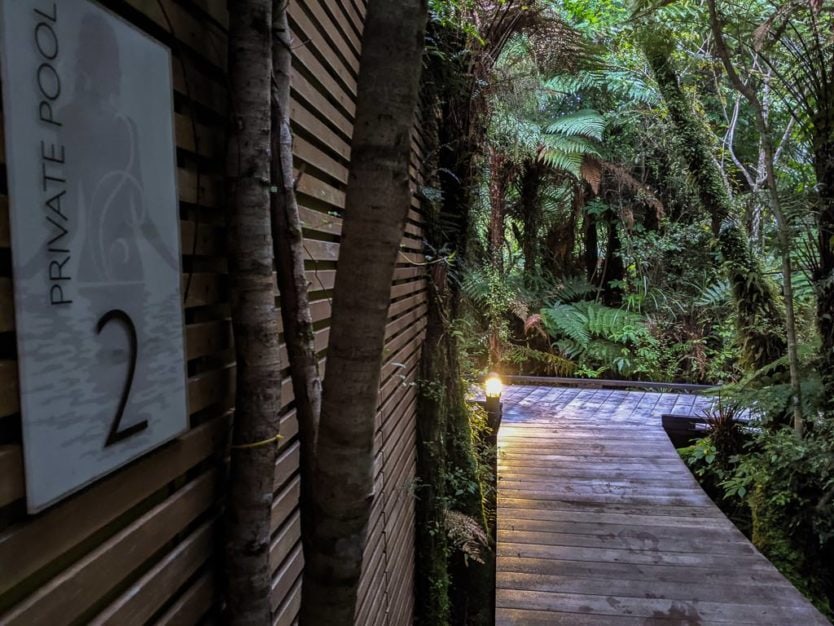 entry to a private pool at the franz josef glacier hot pools a peaceful new zealand hot spring