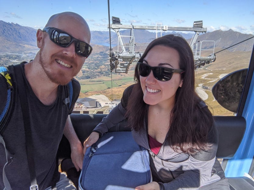 on gondola with picnic hamper at coronet peak