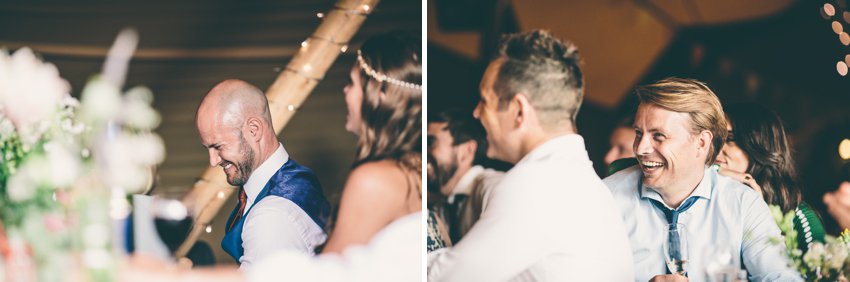 Groom laughing at best mans speech