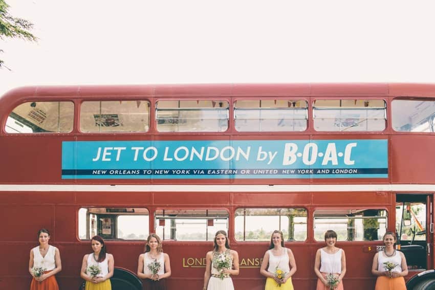 Bridesmaid portraits in front of London red bus