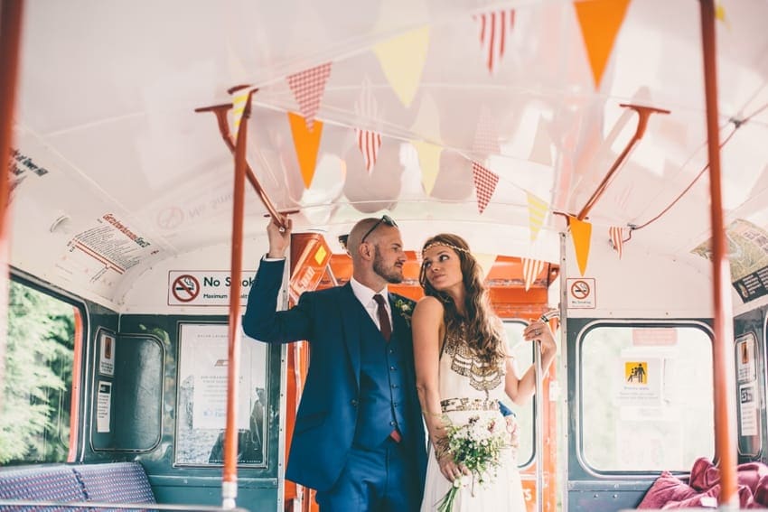 Creative couple portraits on Big red bus