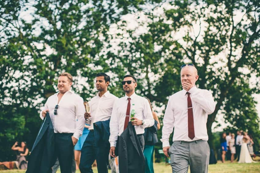 Groomsmen at a festival tipi wedding