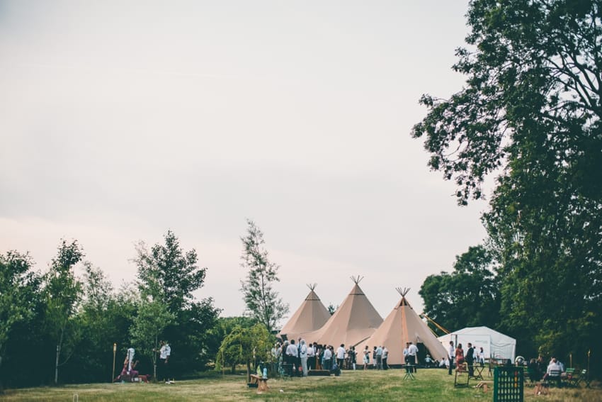 Tipi in a field for a wedding reception