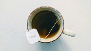 Mug of hot water with a tea bag