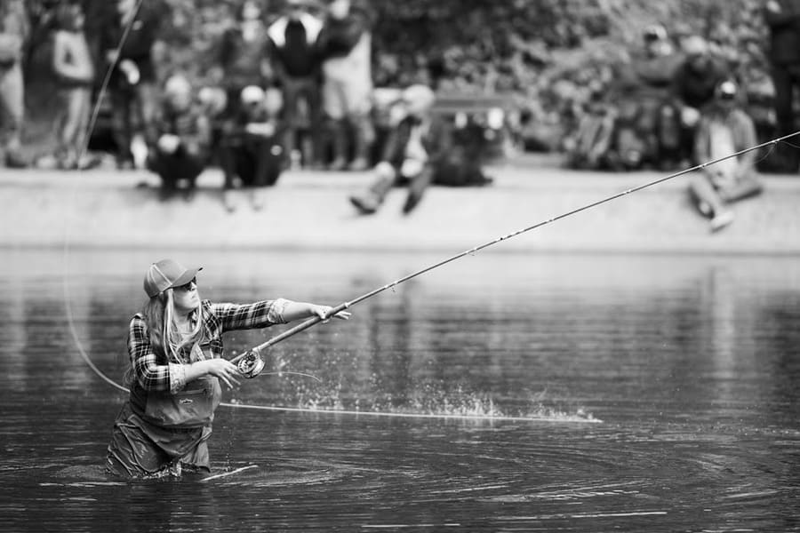 A young woman fly-fishing for trout on the Saloompt River, Bella Coola,  British Columbia, Stock Photo, Picture And Rights Managed Image. Pic.  ACX-ACP69159