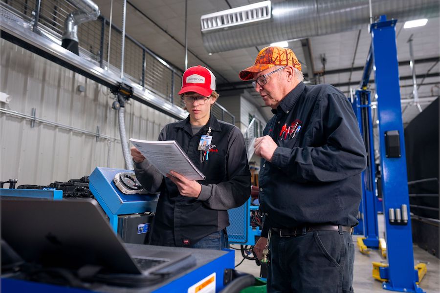 Automotive Technician Instructor teaching a student at WyoTech