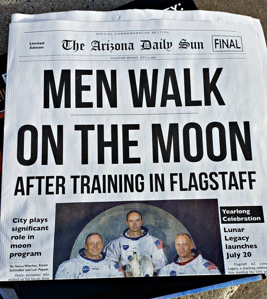 newspaper headline that reads "Men Walk on the Moon after Training in Flagstaff"