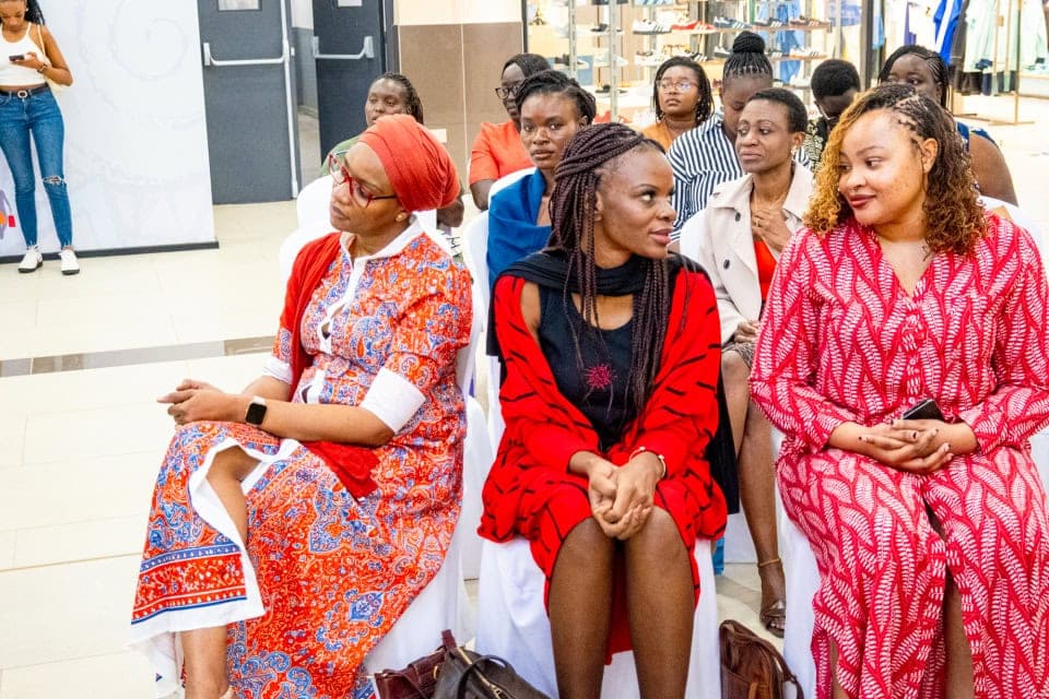 Guests sit together and listen during the Style, Shop & Sip event with Connie Oluoch.