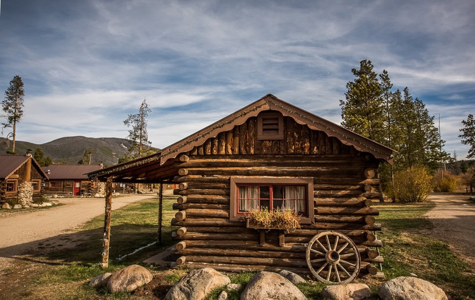 Grand Lake Cabin Rental by Colorado Cabin Adventures with mountains in the background