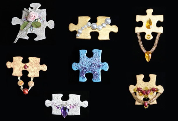 Brooches made from jig-saw puzzle pieces