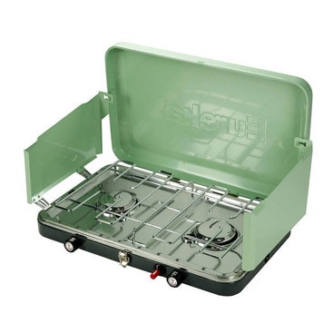 Small portable green camping stove with two areas for cooking on and a wind protector.