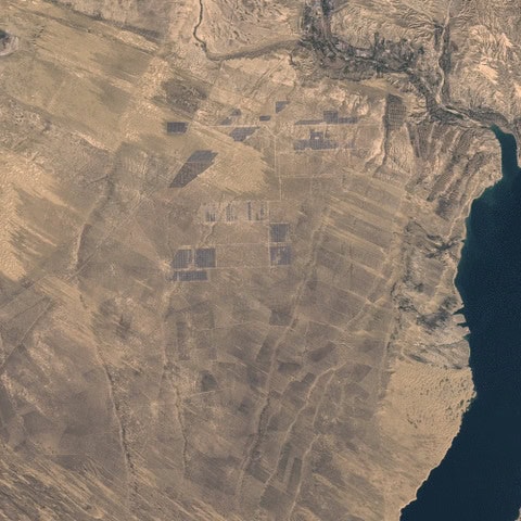 The expansion of China's solar panel farms from space.