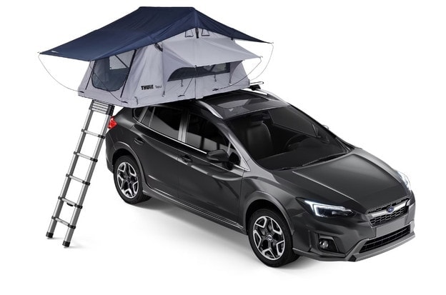 Softshell Thule rooftop tent on car