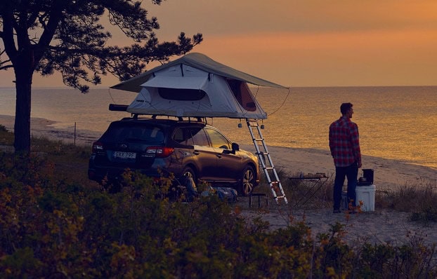 Thule Tepui rooftop tent on a beach