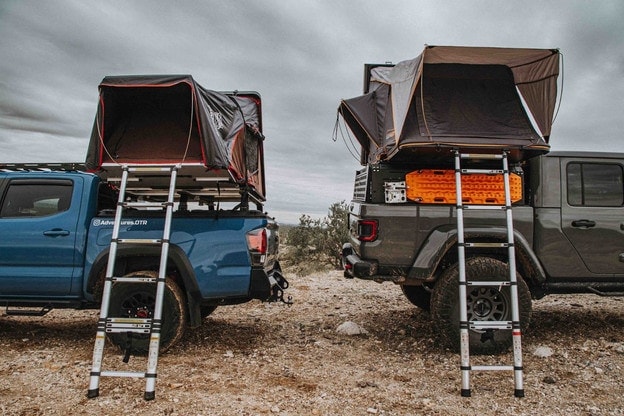 iKamper on a Toyota Tacoma next to a Roofnest on a Jeep Gladiator