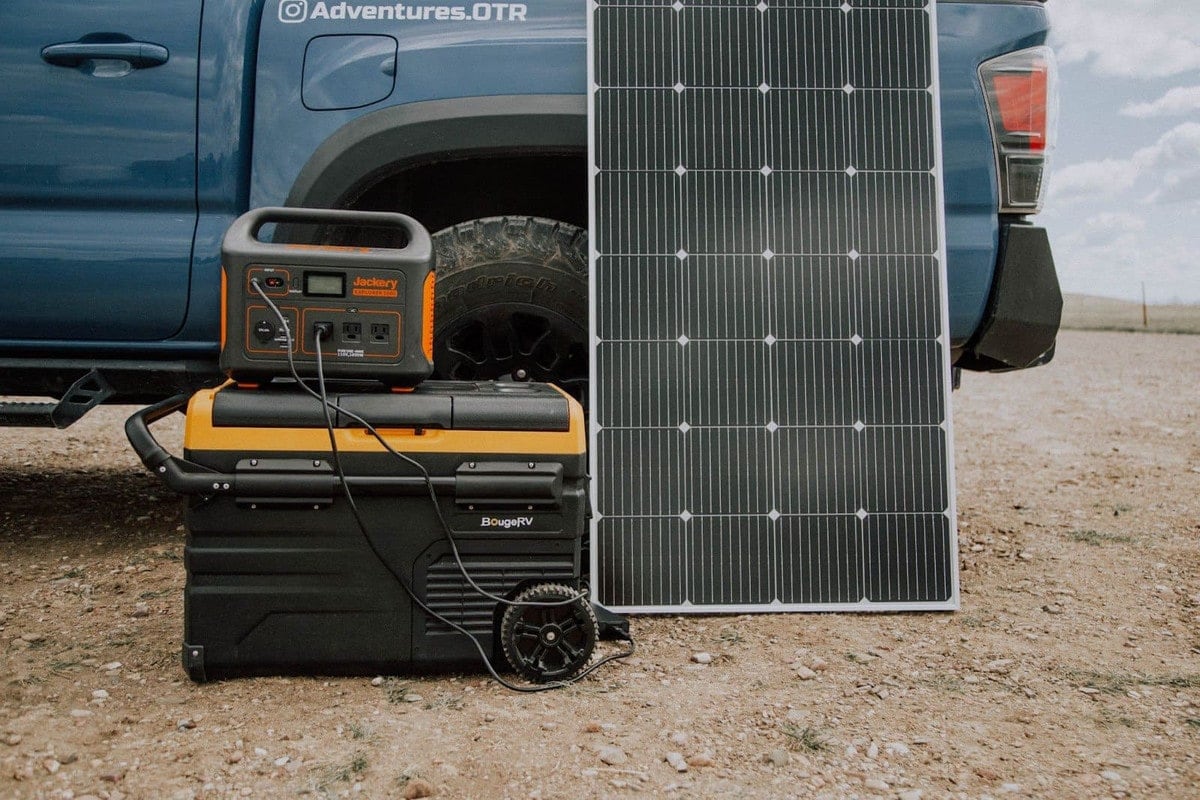 BougeRV solar panel powering Jackery Explorer 1000 solar power station and portable 12v fridge.