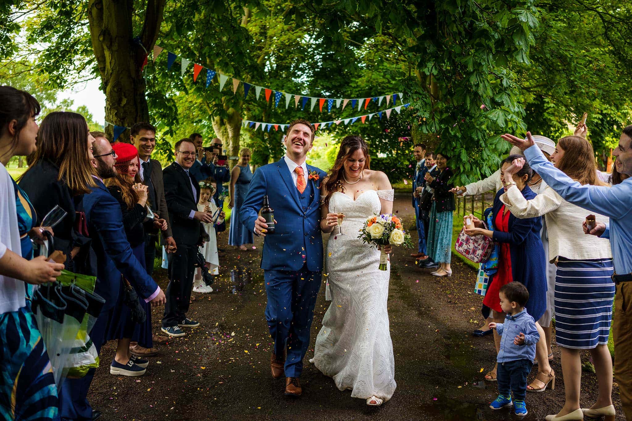 confetti walk for the bride and groom at Talton Lodge