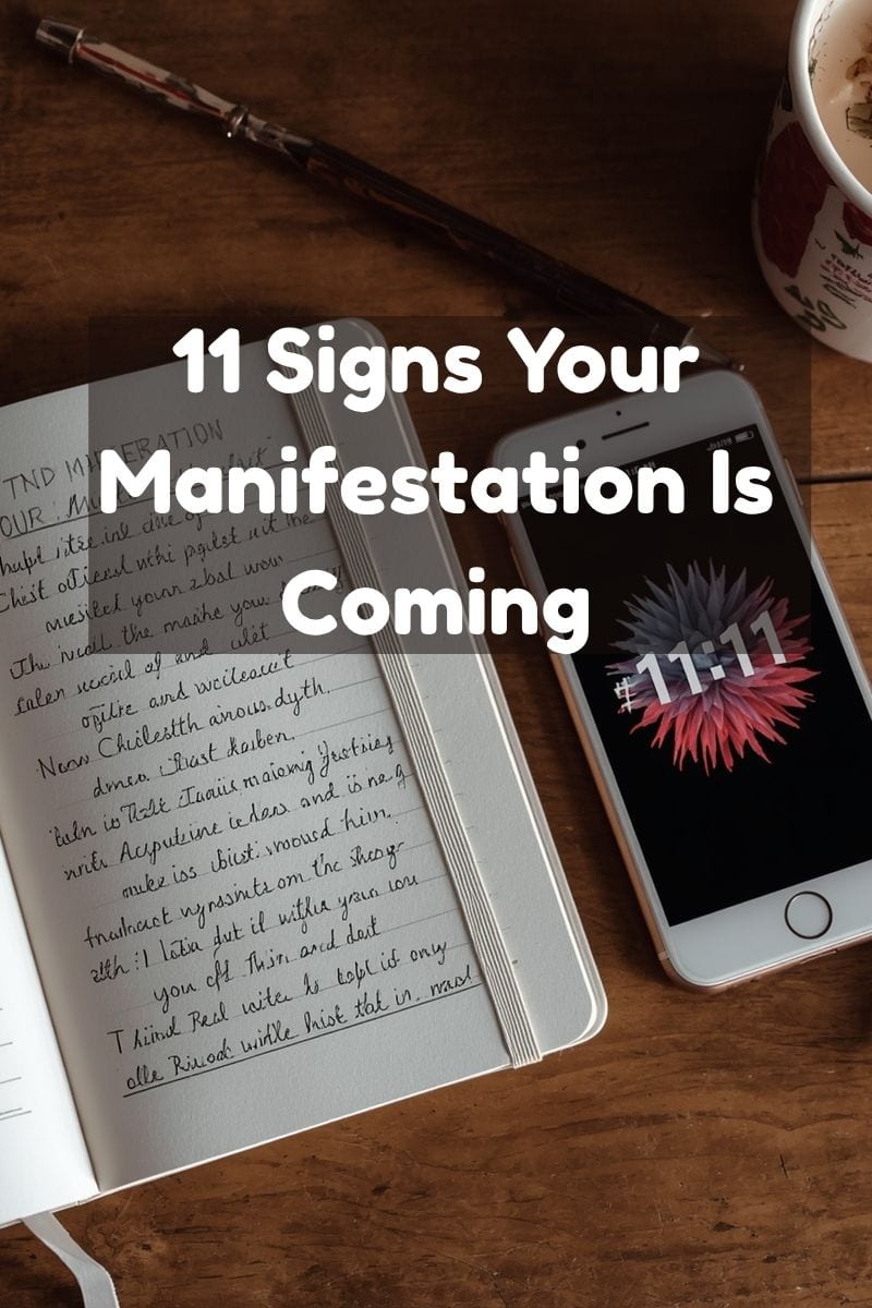 Person with manifestation journal, repeating number and an opportunity illustrating signs your manifestation is coming.