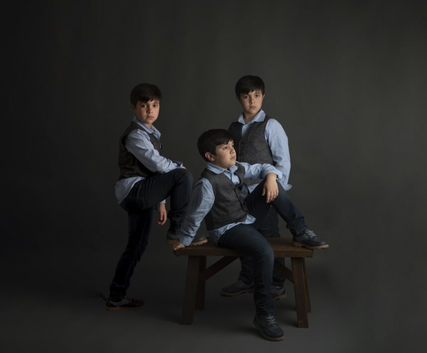 Artistic studio portrait showing the same boy in three distinct poses, digitally composed by Diego’s Photography in Johns Creek<br />
