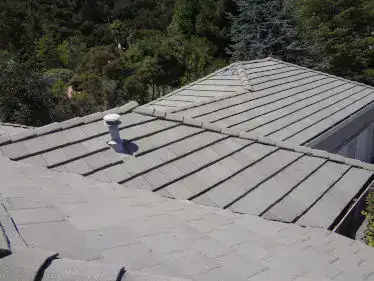 Who repairs tile roofs in Carmel?