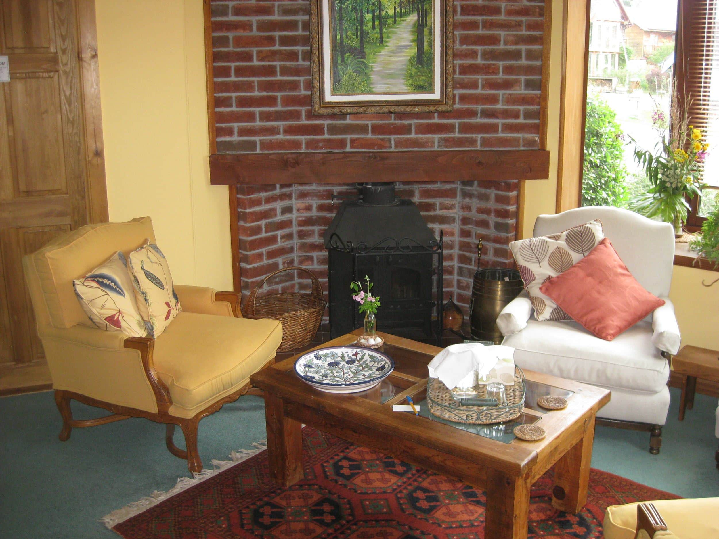 Guest's lounge with fireplace