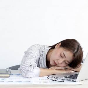 Woman sleeping on the table