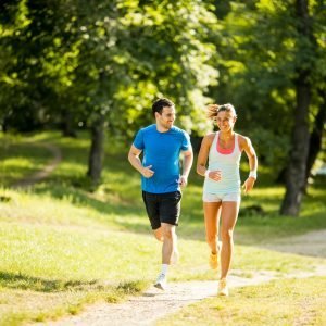 Young couple running