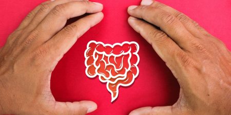 hand making a bracket with a gut icon in the middle