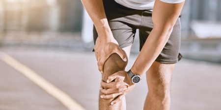 Runner training accident with joint pain, arthritis and tendon problems. Health, fitness and a spor