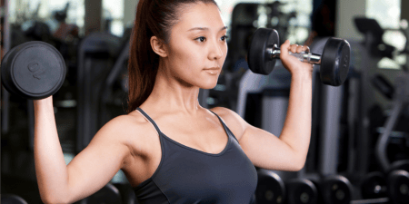 young-woman-lifting-weights-2022-04-01-21-20-41-utc 1