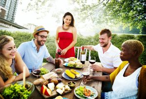 Group of friends having a yard party