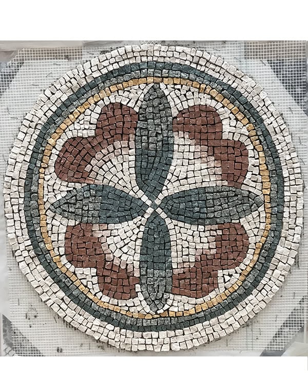 détail d'un motif circulaire de mosaïque antique en marbre