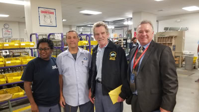 Back Bay Union Stewards Lucy Warren & John DiBlasi, and President Jerry McCarthy congratulate Newly Retired Tom McDonough on a job well done.