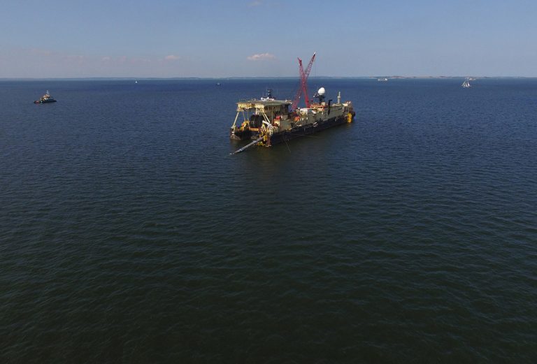 LUBMIN, GERMANY - AUGUST 16: In this aerial view the Castoro 10 pipelay vessel lays concrete-coated pipe for the Nord Stream 2 gas pipeline onto the seabed of the Baltic Sea on August 16, 2018 near Lubmin, Germany. The Nord Stream 2 pipeline will transport Russian natural gas from Narva Bay in Russia to Greifswald in Germany, creating an additional, direct natural gas route between Russia and western Europe. Both Poland and Ukraine have voiced their opposition to the Nord Stream project. (Photo by Sean Gallup/Getty Images)